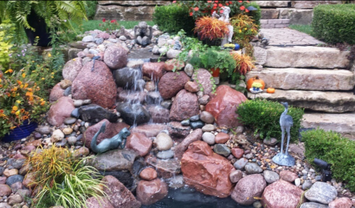 Waterfall feature with lighting